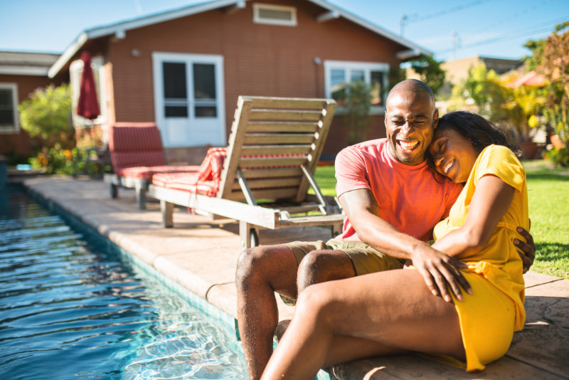 A happy couple by the pool